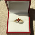 7 GARNET, 9CT SOLID GOLD RING